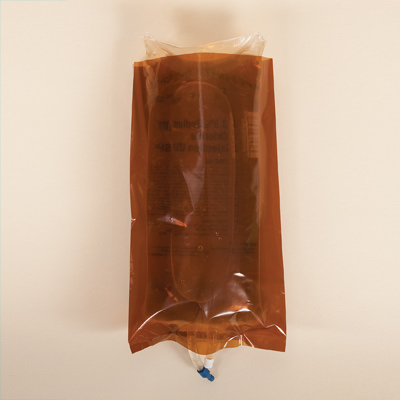 An IV bag cover in amber